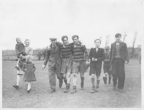 Team players including Norman Tennant