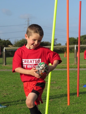 Minis practicing rugby skills